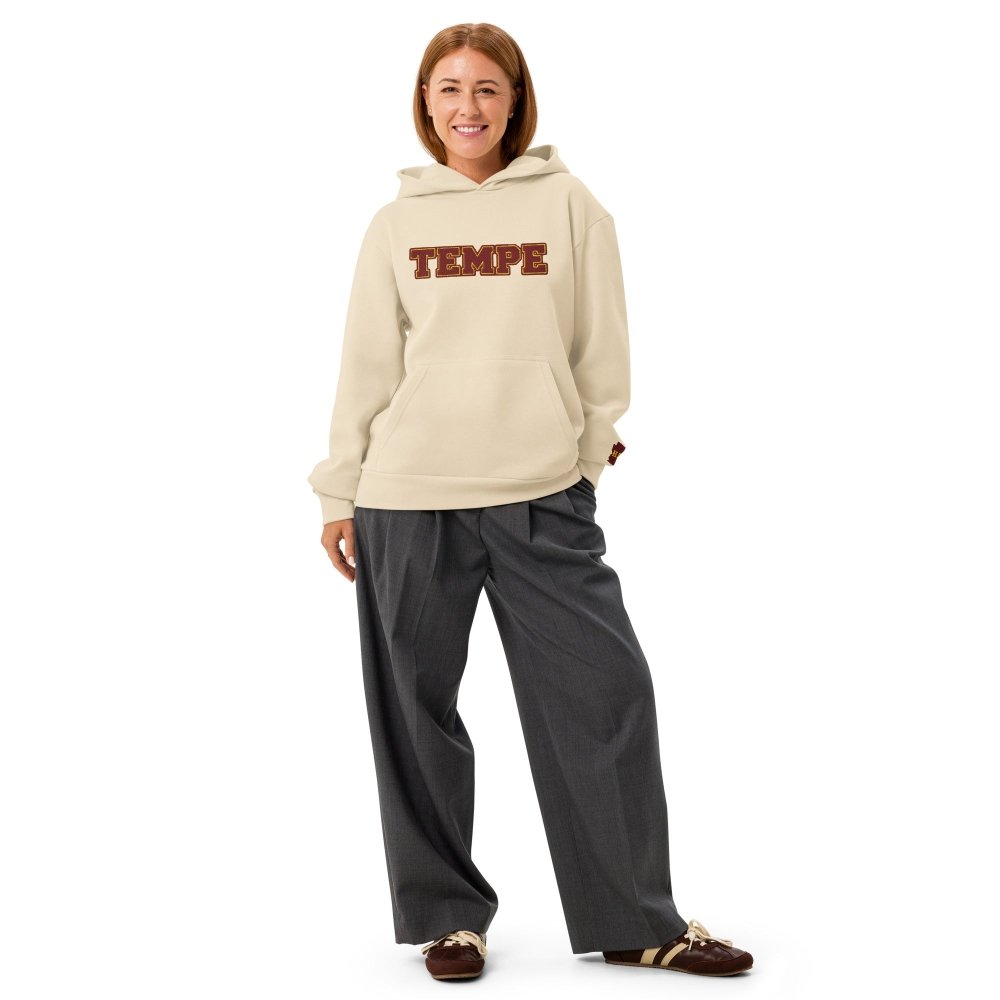 Model wearing a ivory HAGS Tempe Arizona hoodie with maroon TEMPE chest lettering.