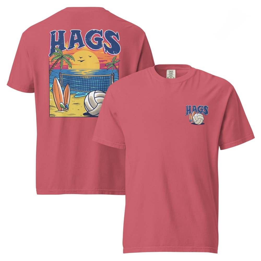 Front and back views of faded red HAGS beach volleyball sunset T-shirt, showing small HAGS volleyball chest logo and a volleyball, surfboards and beach sunset graphic.