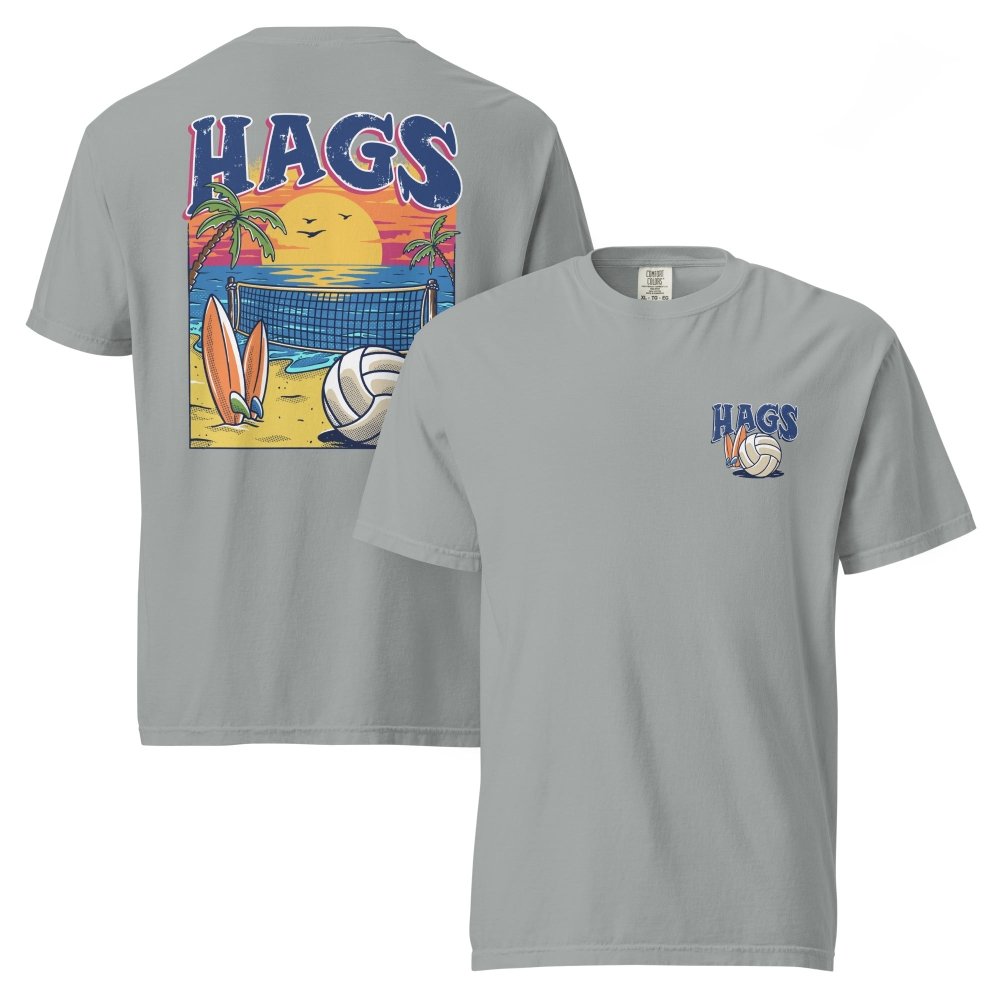 Front and back views of gray HAGS beach volleyball sunset T-shirt, showing small HAGS volleyball chest logo and a volleyball, surfboards and beach sunset graphic.