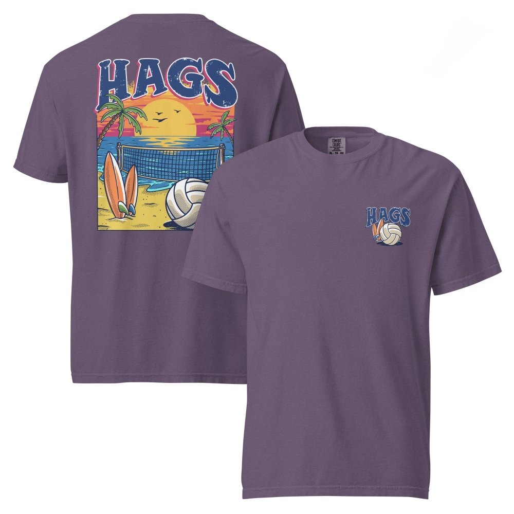 Front and back views of purple HAGS beach volleyball sunset T-shirt, showing small HAGS volleyball chest logo and a volleyball, surfboards and beach sunset graphic.