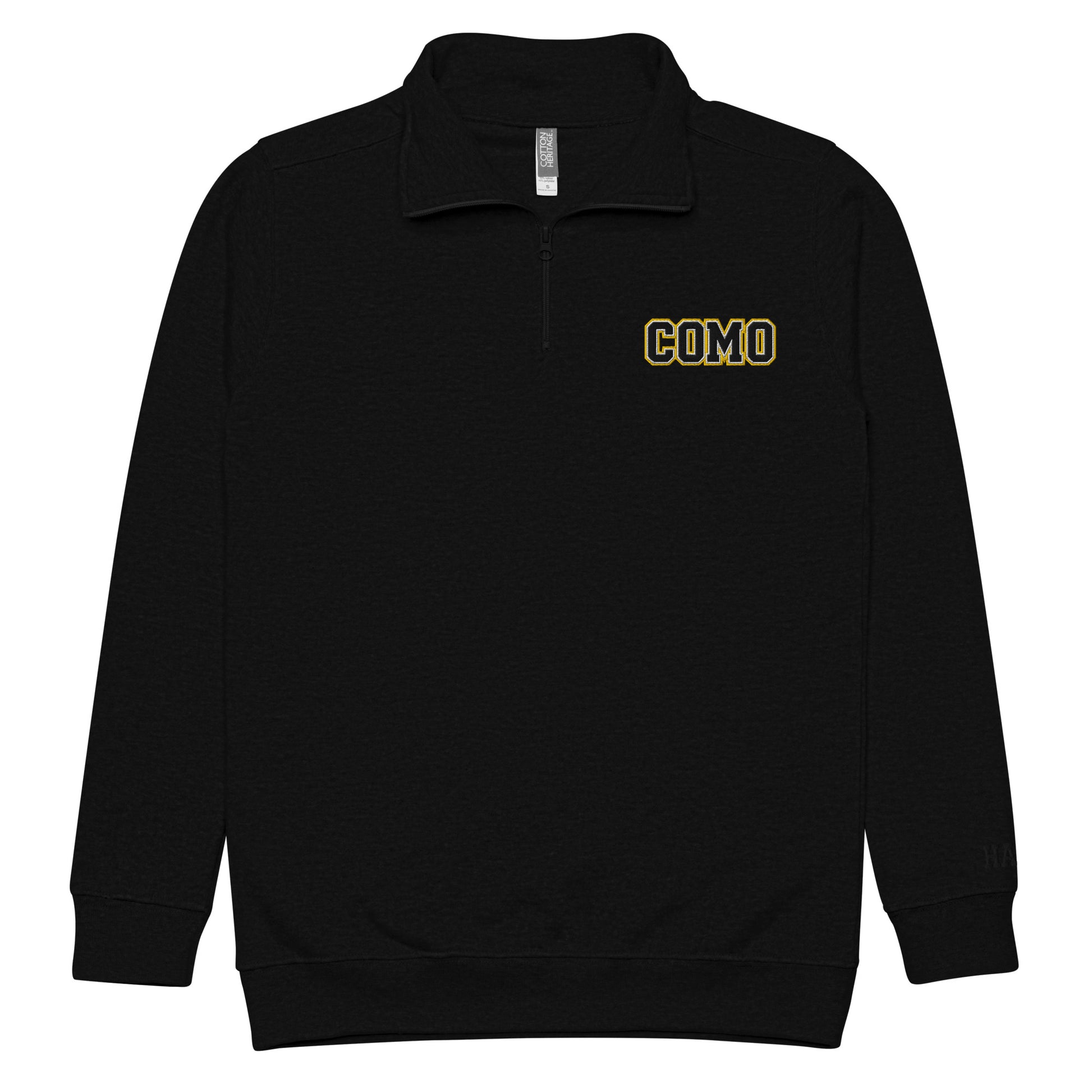 Front view of black HAGS COMO embroidered quarter-zip pullover, showing small COMO chest embroidery and zipper.
