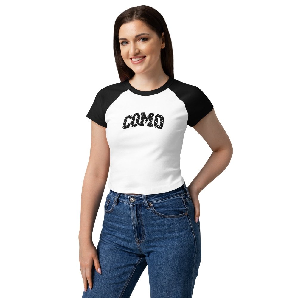 Model wearing a white and black HAGS COMO Missouri raglan baby tee with black polka-dot lettering.