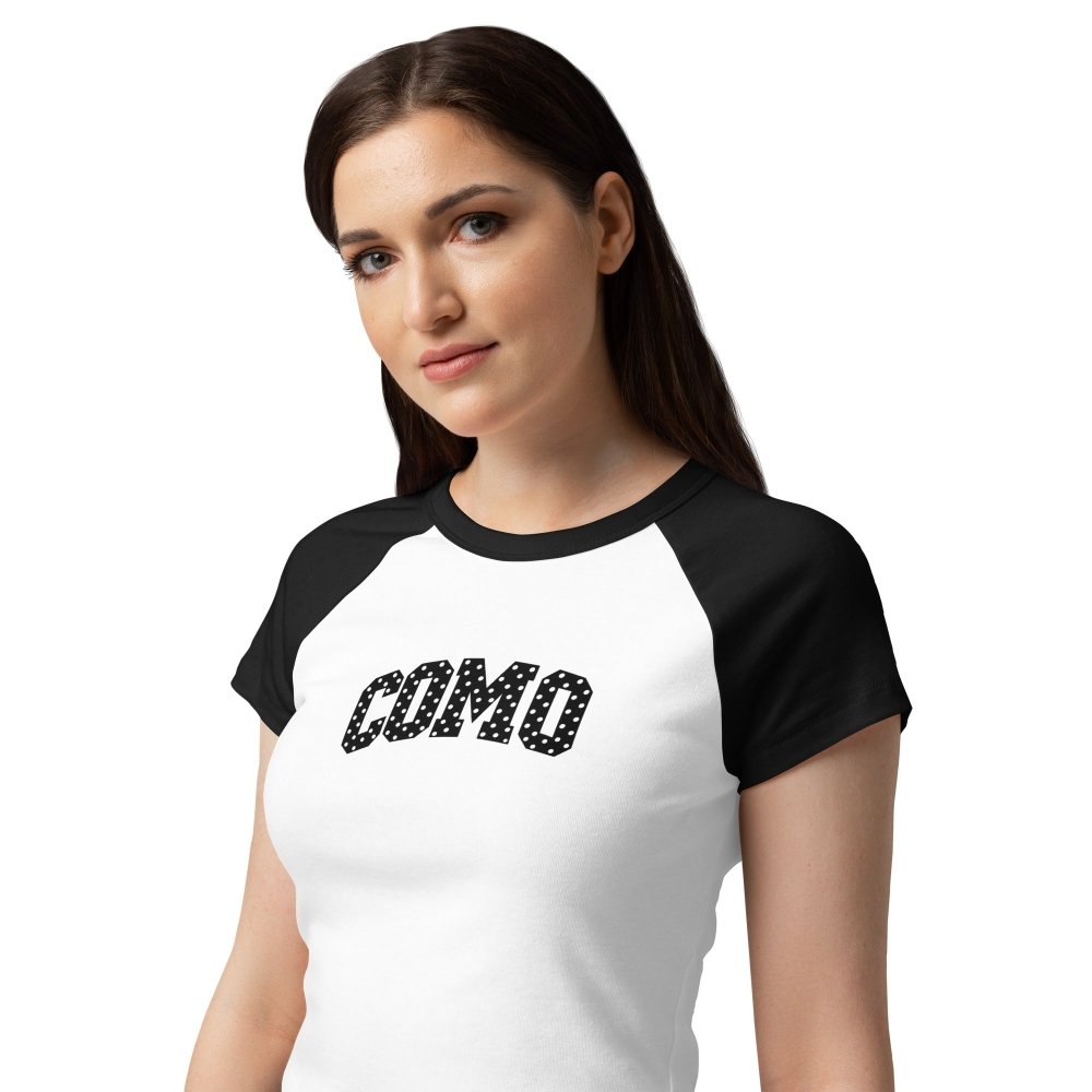 Model wearing a white and black HAGS COMO Missouri raglan baby tee with black polka-dot lettering.
