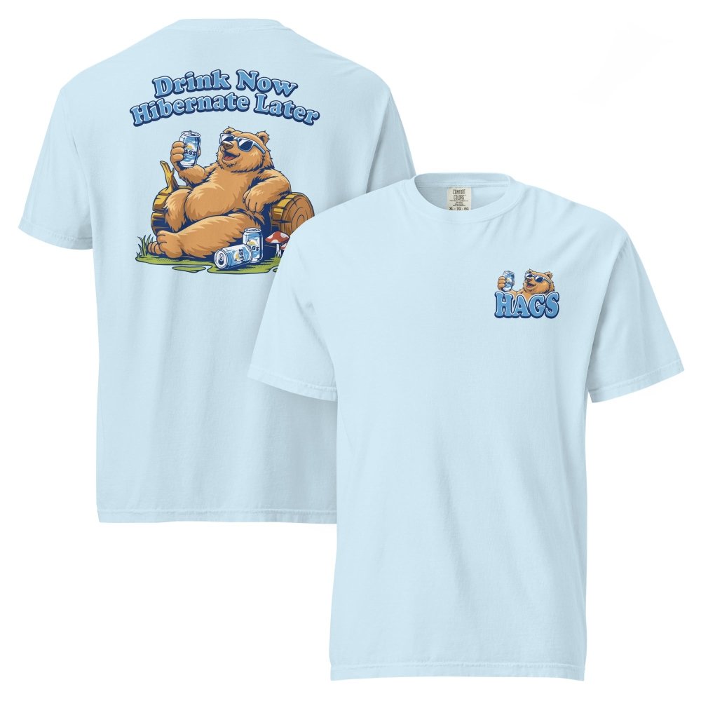 Front and back views of light blue HAGS Drink Now Hibernate Later bear T-shirt, showing small HAGS bear chest graphic and a seated bear and Drink Now Hibernate Later lettering.