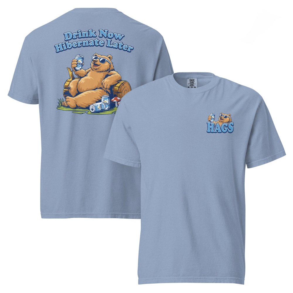 Front and back views of washed blue HAGS Drink Now Hibernate Later bear T-shirt, showing small HAGS bear chest graphic and a seated bear and Drink Now Hibernate Later lettering.