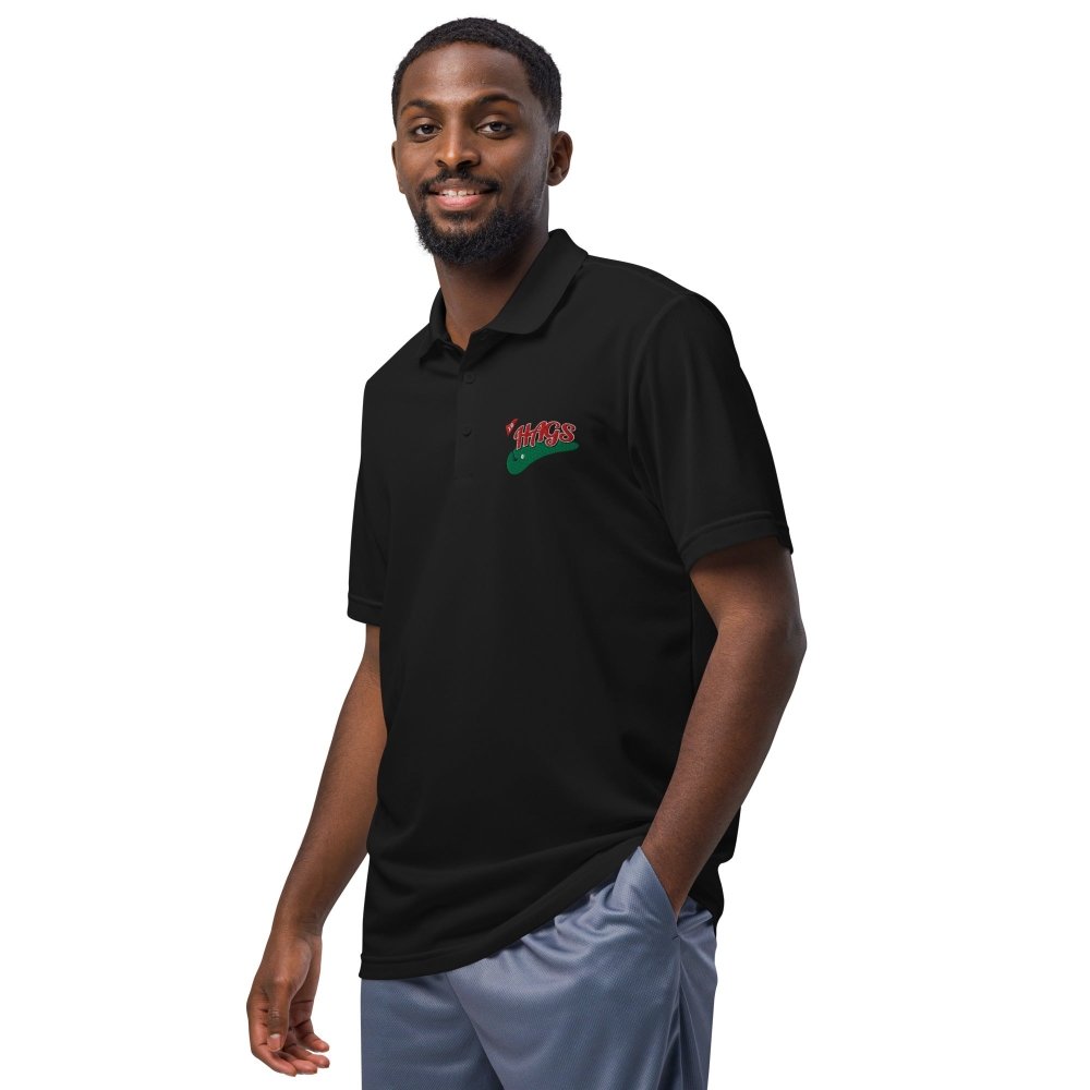 Model wearing a black HAGS Golf Adidas polo with chest embroidery and an Adidas sleeve logo.