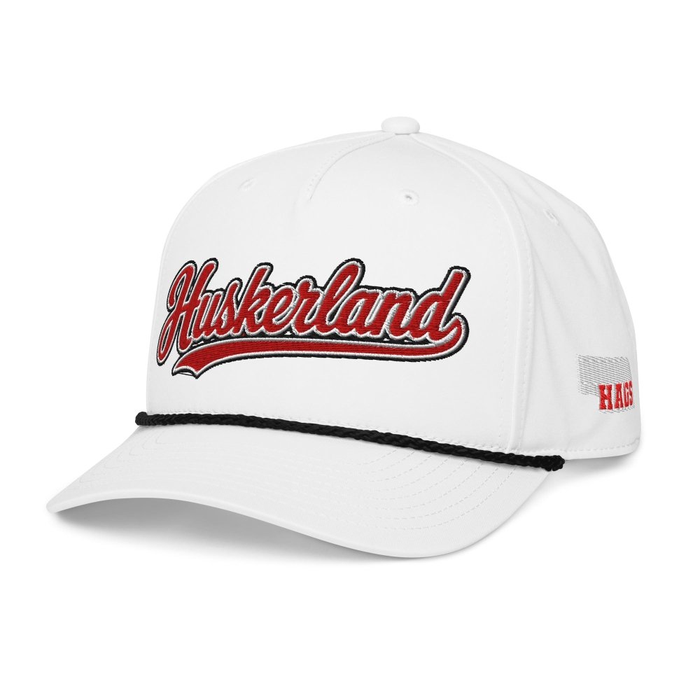 Angled front view of white HAGS Huskerland Nebraska rope hat, showing red Huskerland script.