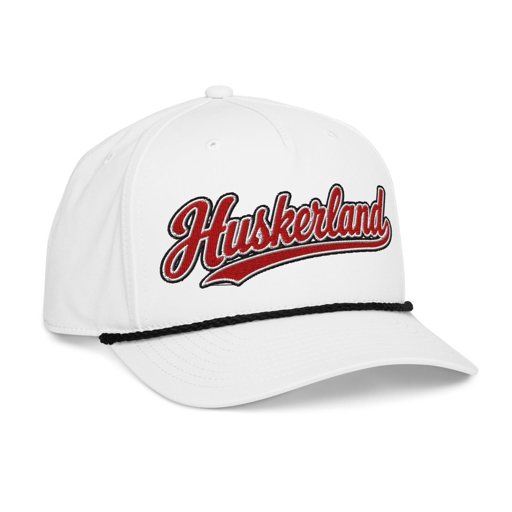 Opposite angled front view of white HAGS Huskerland Nebraska rope hat, showing red Huskerland script.