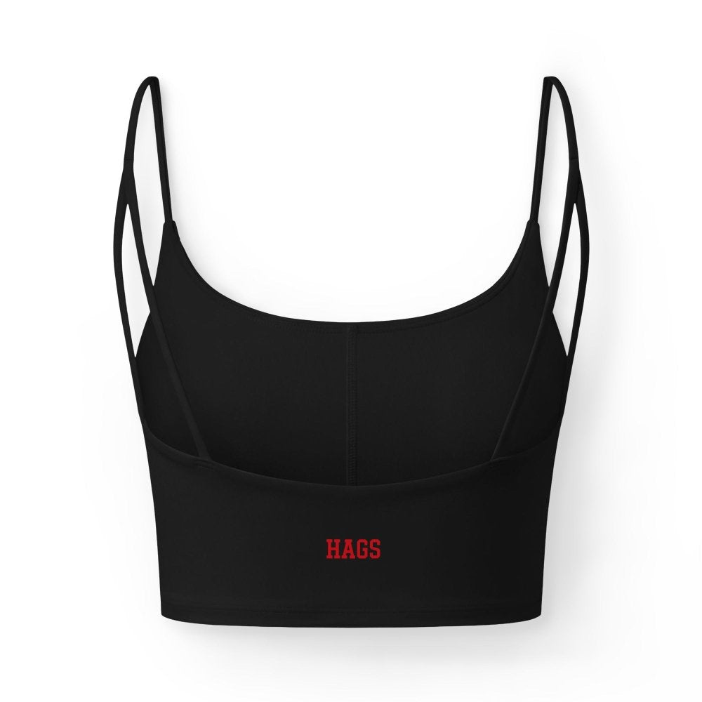 Back view of black HAGS KCMO Kansas City crop top, showing small red HAGS logo and thin straps.