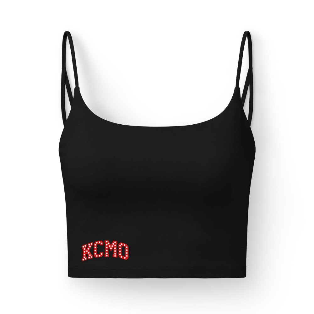 Front view of black HAGS KCMO Kansas City crop top, showing red KCMO lettering near the hem and thin straps.