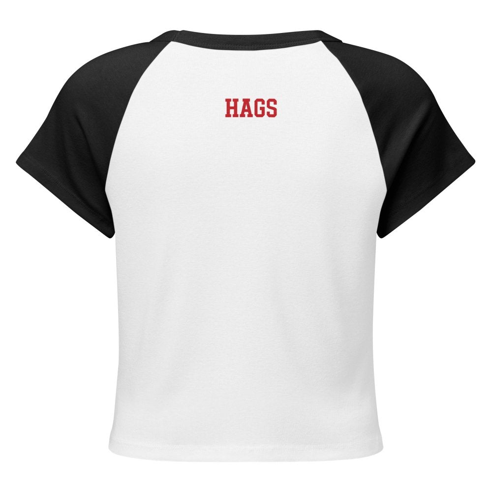 Back view of white and black HAGS KCMO polka dot raglan baby tee, showing small red HAGS lettering below the collar.