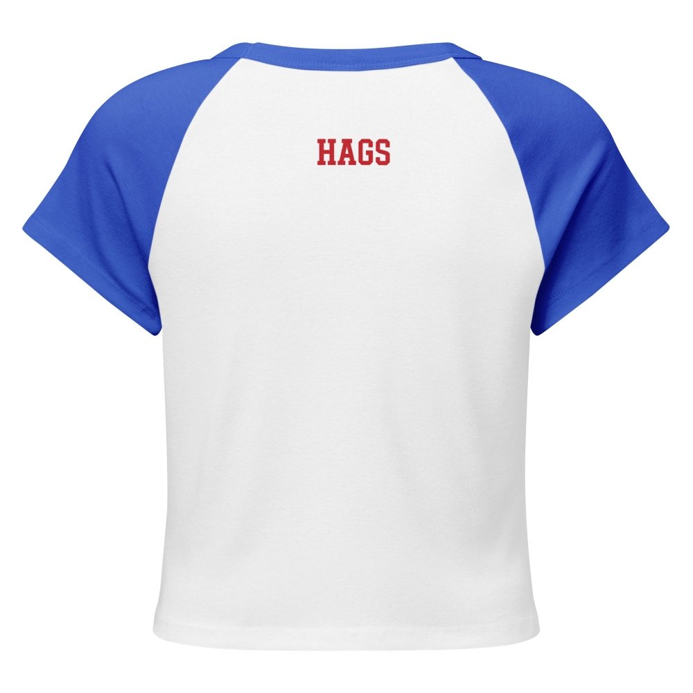 Back view of white and blue HAGS KCMO polka dot raglan baby tee, showing small red HAGS lettering below the collar.