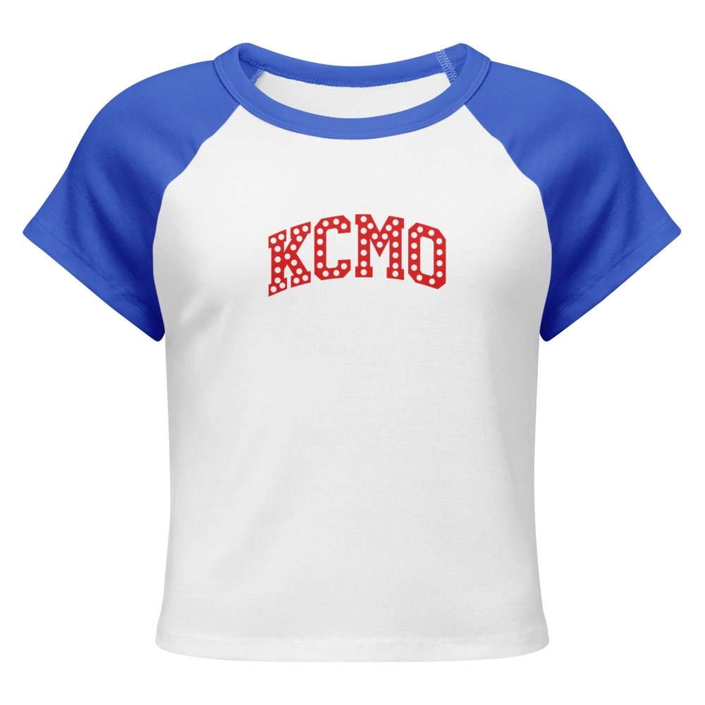 Front view of white and blue HAGS KCMO polka dot raglan baby tee, showing red polka-dot KCMO lettering.