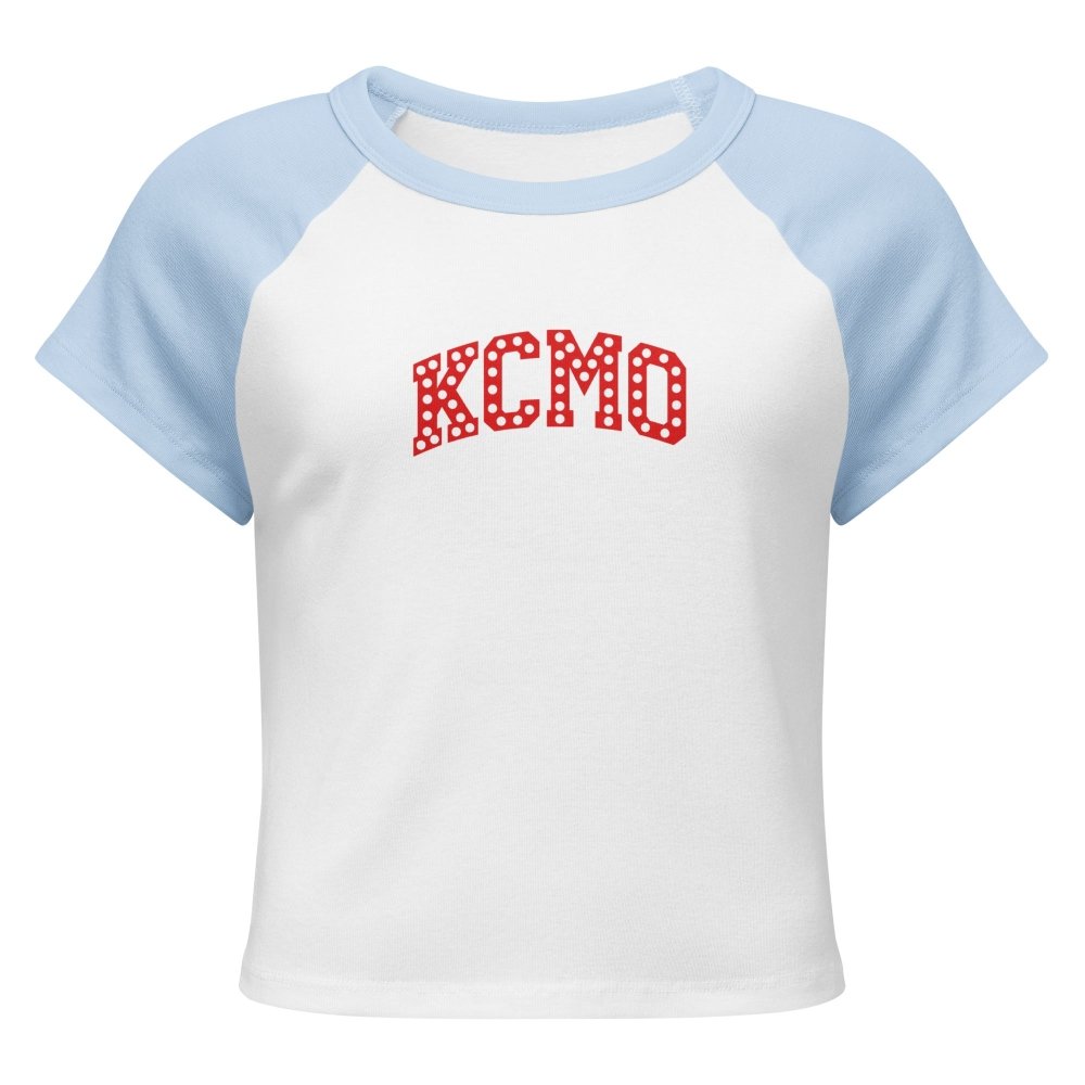 Front view of white and light blue HAGS KCMO polka dot raglan baby tee, showing red polka-dot KCMO lettering.