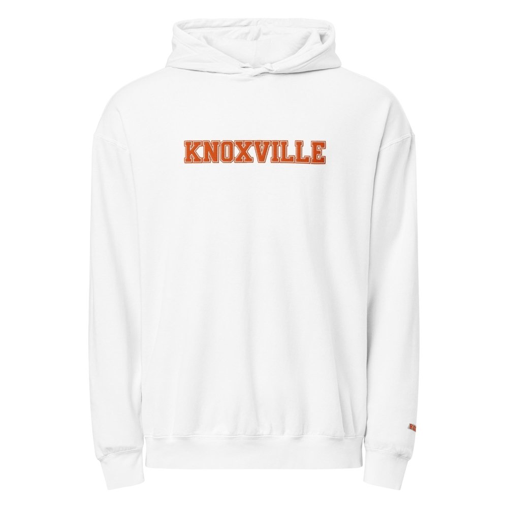 Front view of white HAGS Knoxville Tennessee embroidered hoodie, showing orange KNOXVILLE chest lettering.