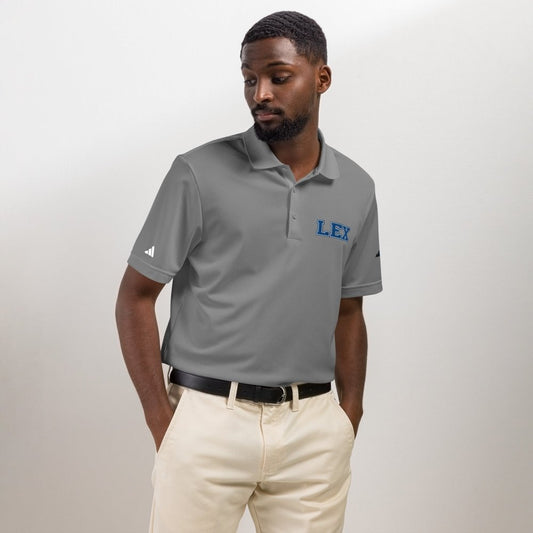 Model wearing a gray HAGS Lexington Kentucky polo with blue LEX chest embroidery.