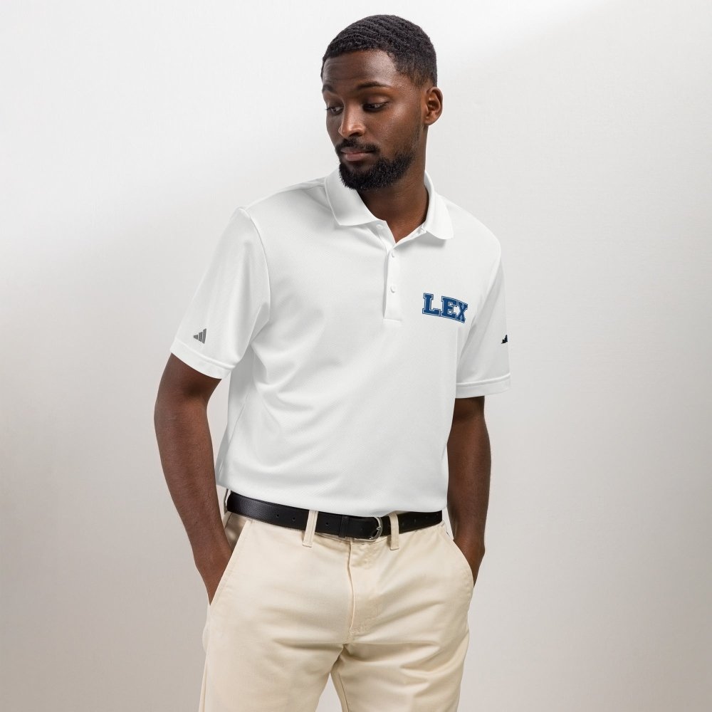 Model wearing a white HAGS Lexington Kentucky polo with blue LEX chest embroidery.