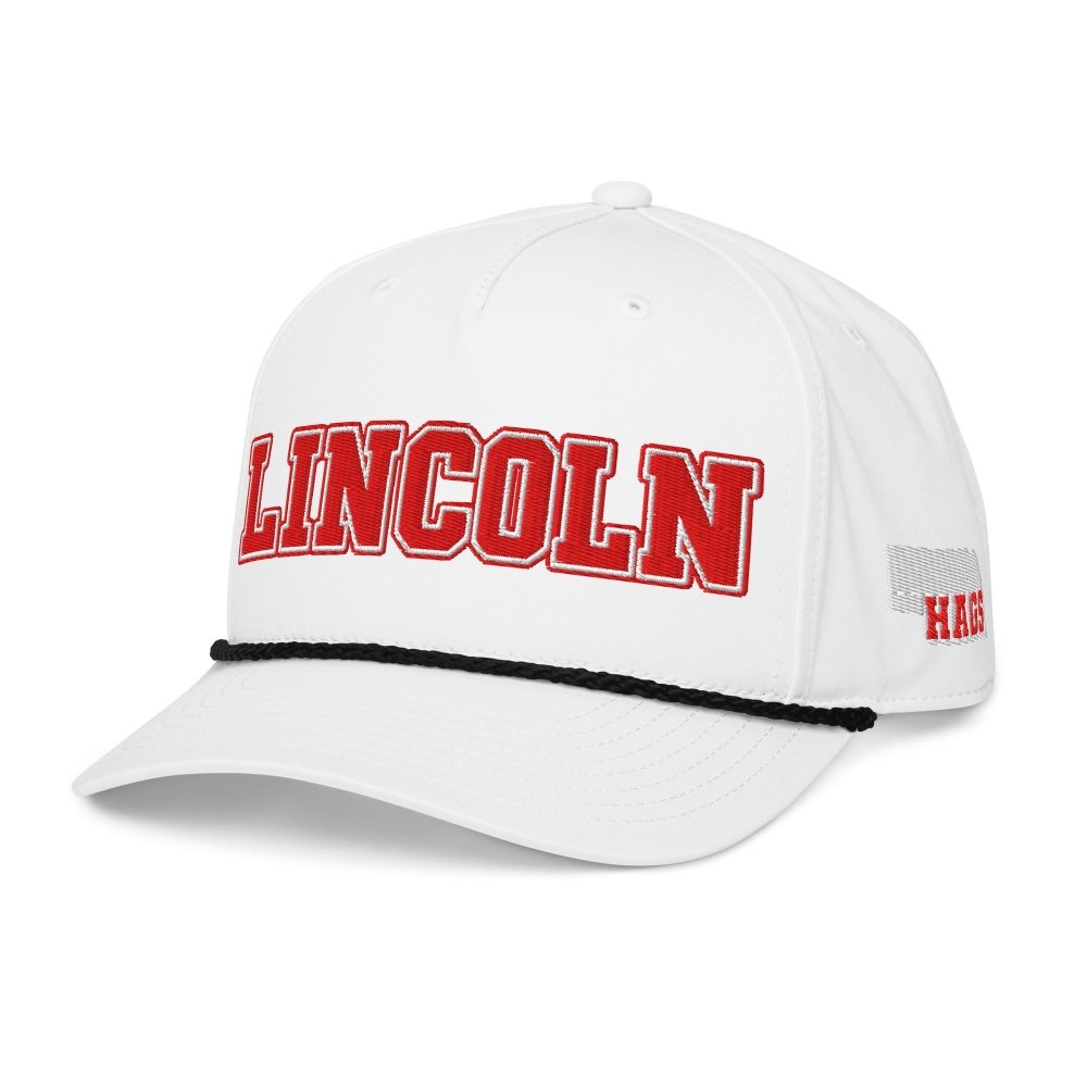 Angled front view of white HAGS Lincoln Nebraska rope hat, showing red LINCOLN lettering.