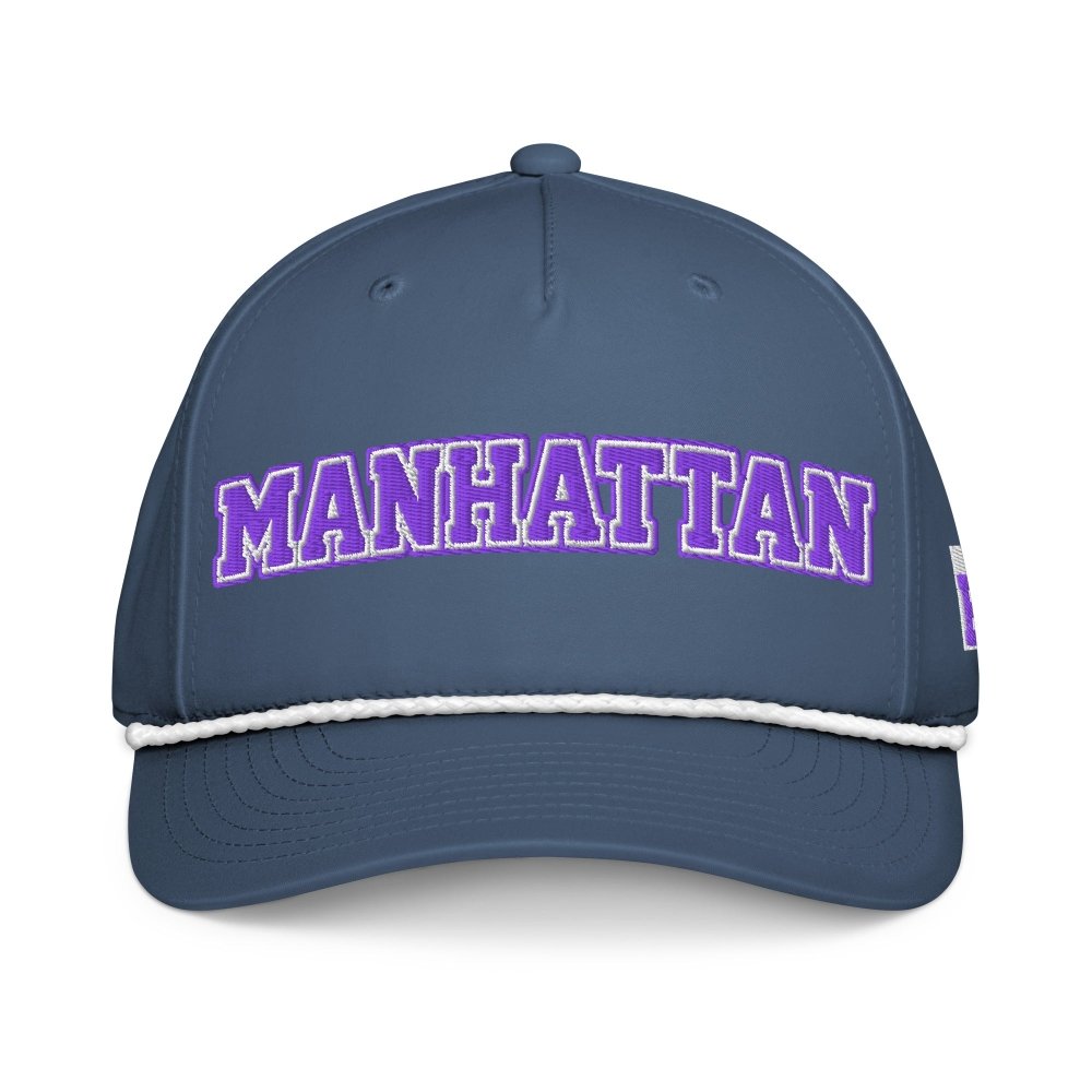 Front view of navy HAGS Manhattan Kansas rope hat, showing purple MANHATTAN lettering and contrasting rope.