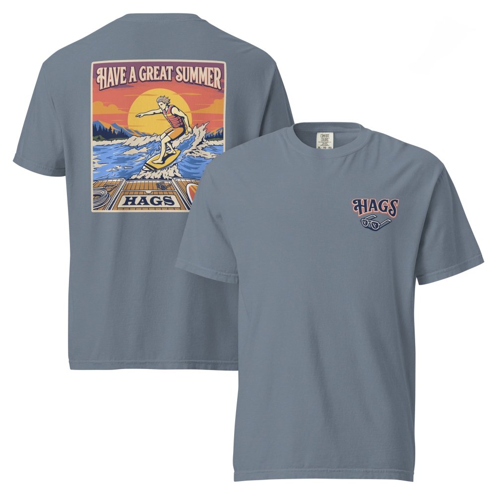 Front and back views of blue gray HAGS mens wakesurf T-shirt, showing small HAGS chest logo and a wakesurfer riding in front of a sunset.