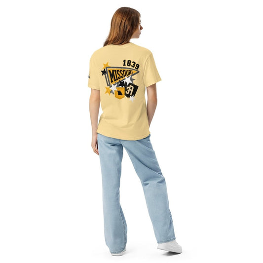 Model wearing a yellow HAGS Missouri pennant T-shirt, showing the large back graphic.
