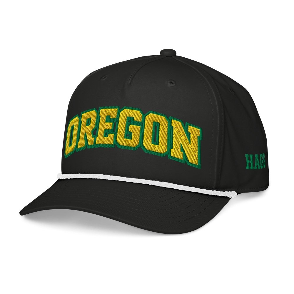 Angled front view of black HAGS Oregon rope hat, showing green and yellow OREGON lettering.