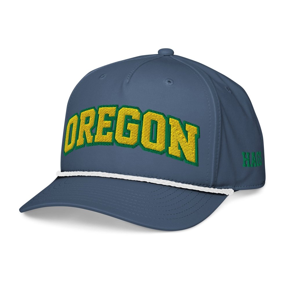 Angled front view of navy HAGS Oregon rope hat, showing green and yellow OREGON lettering.