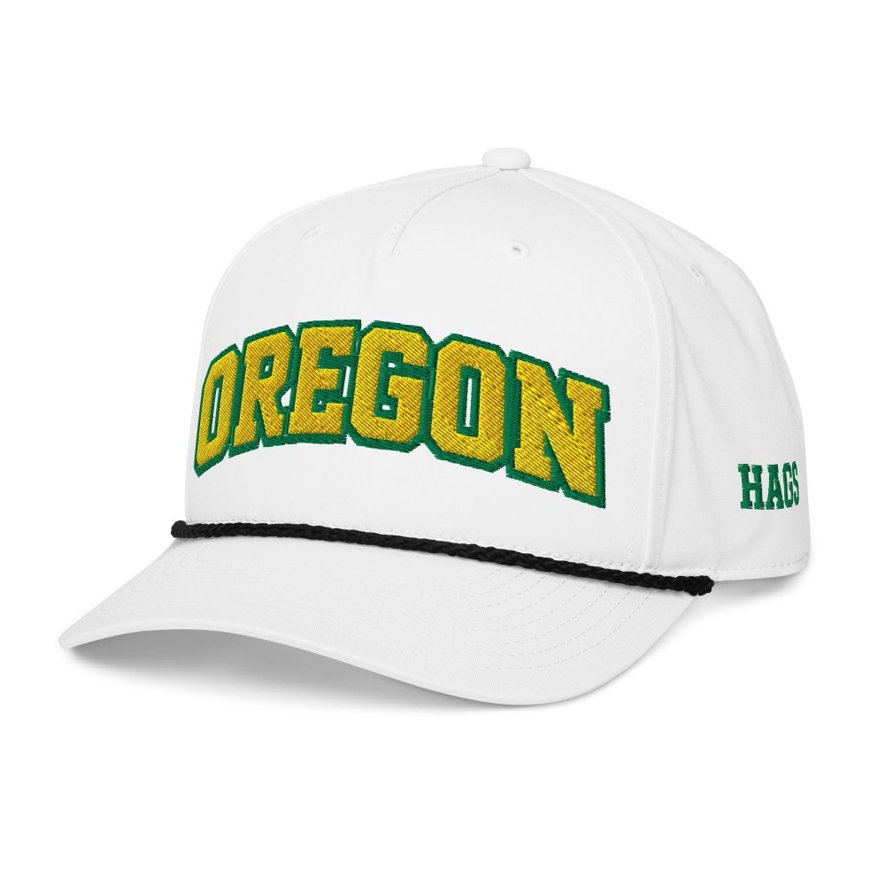 Angled front view of white HAGS Oregon rope hat, showing green and yellow OREGON lettering.