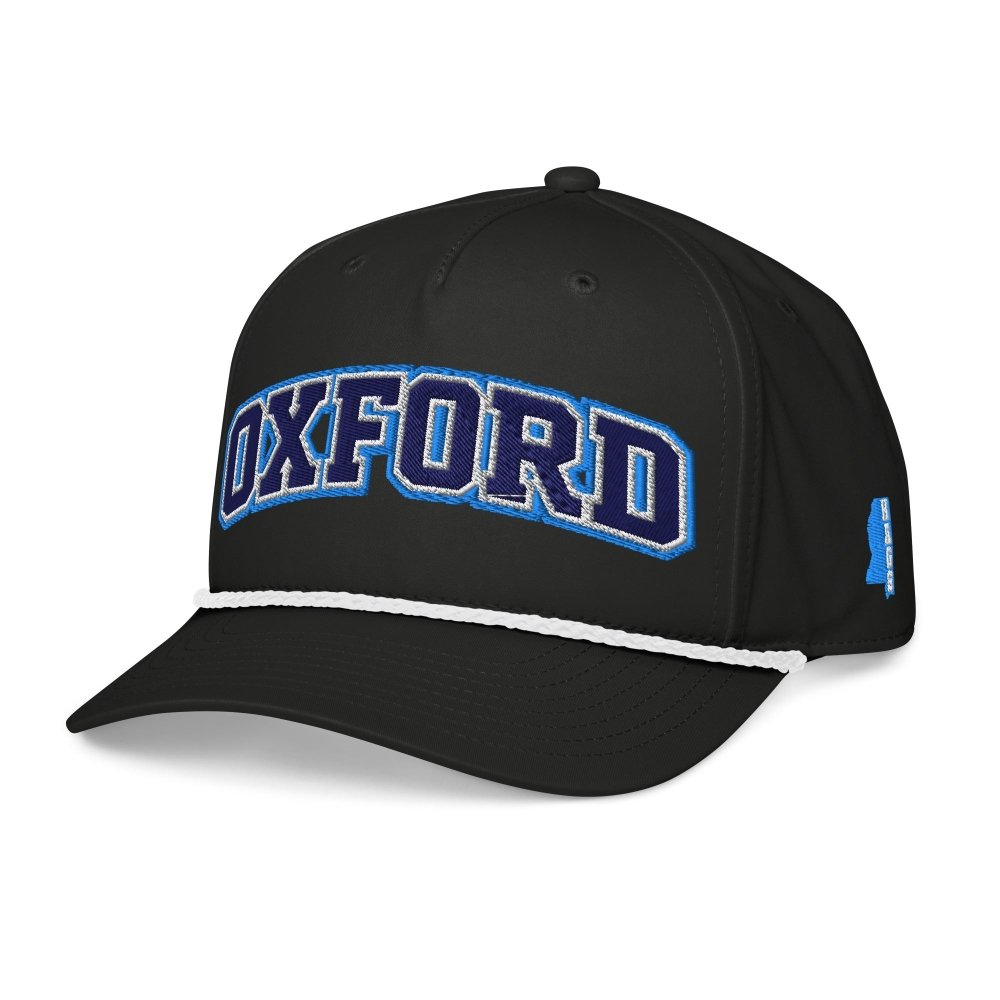 Angled front view of black HAGS Oxford Mississippi rope hat, showing blue OXFORD lettering.