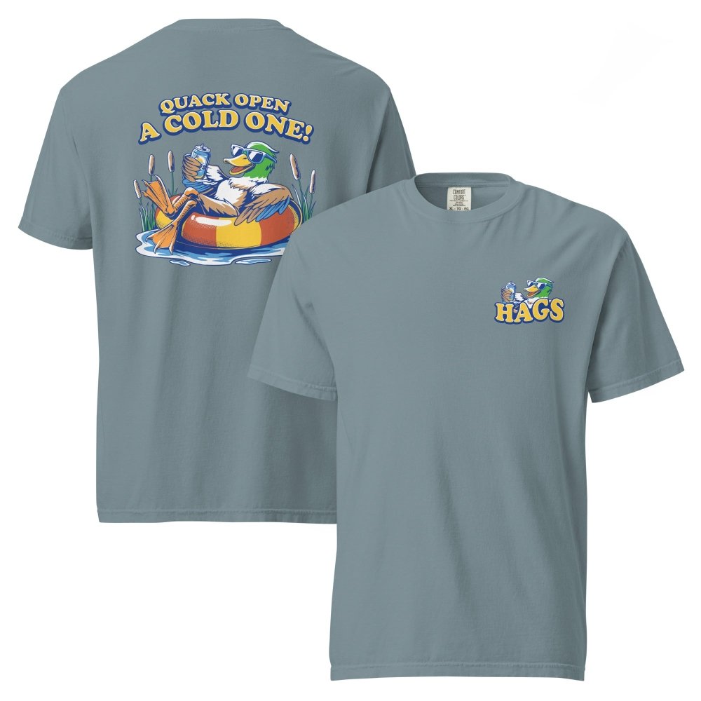 Front and back views of muted blue HAGS Quack Open a Cold One duck T-shirt, showing small HAGS chest graphic and a duck in a tube and Quack Open a Cold One lettering.