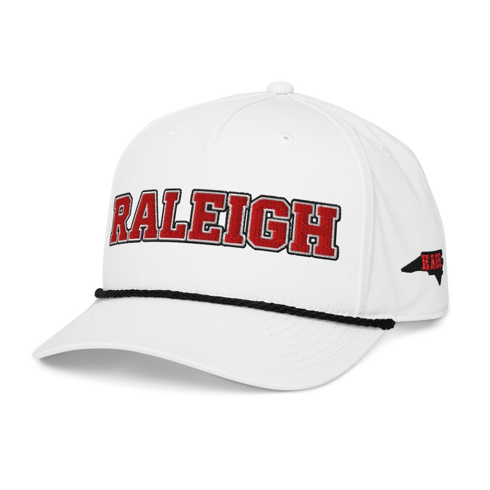 Angled front view of white HAGS Raleigh North Carolina rope hat, showing red RALEIGH lettering.