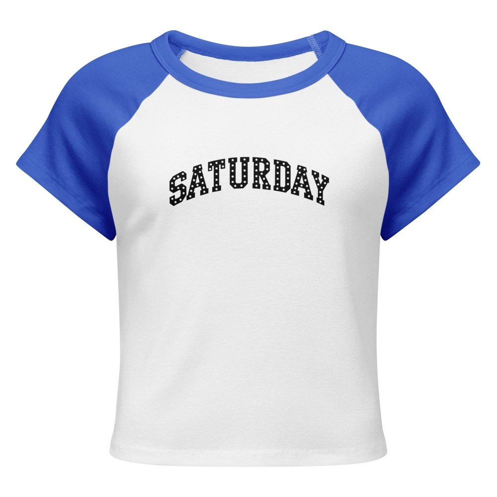 Front view of white and blue HAGS Saturday polka dot raglan baby tee, showing black polka-dot SATURDAY lettering.