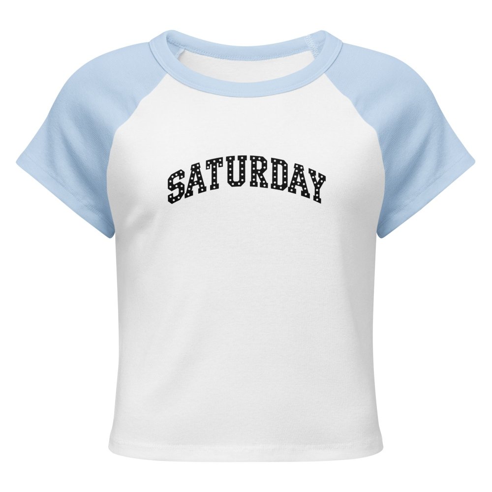 Front view of white and light blue HAGS Saturday polka dot raglan baby tee, showing black polka-dot SATURDAY lettering.