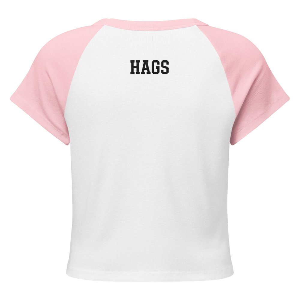 Back view of white and pink HAGS Saturday polka dot raglan baby tee, showing small black HAGS lettering below the collar.