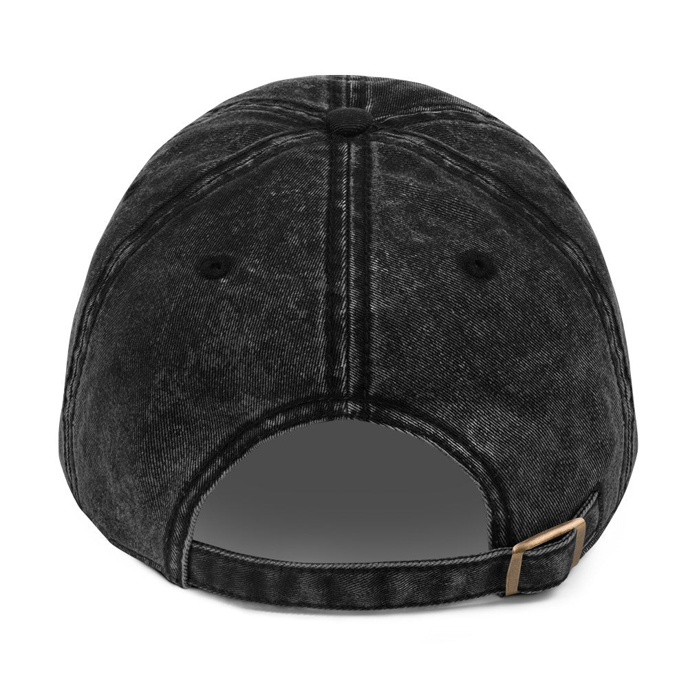 Back view of washed black HAGS State washed dad hat, showing adjustable strap.