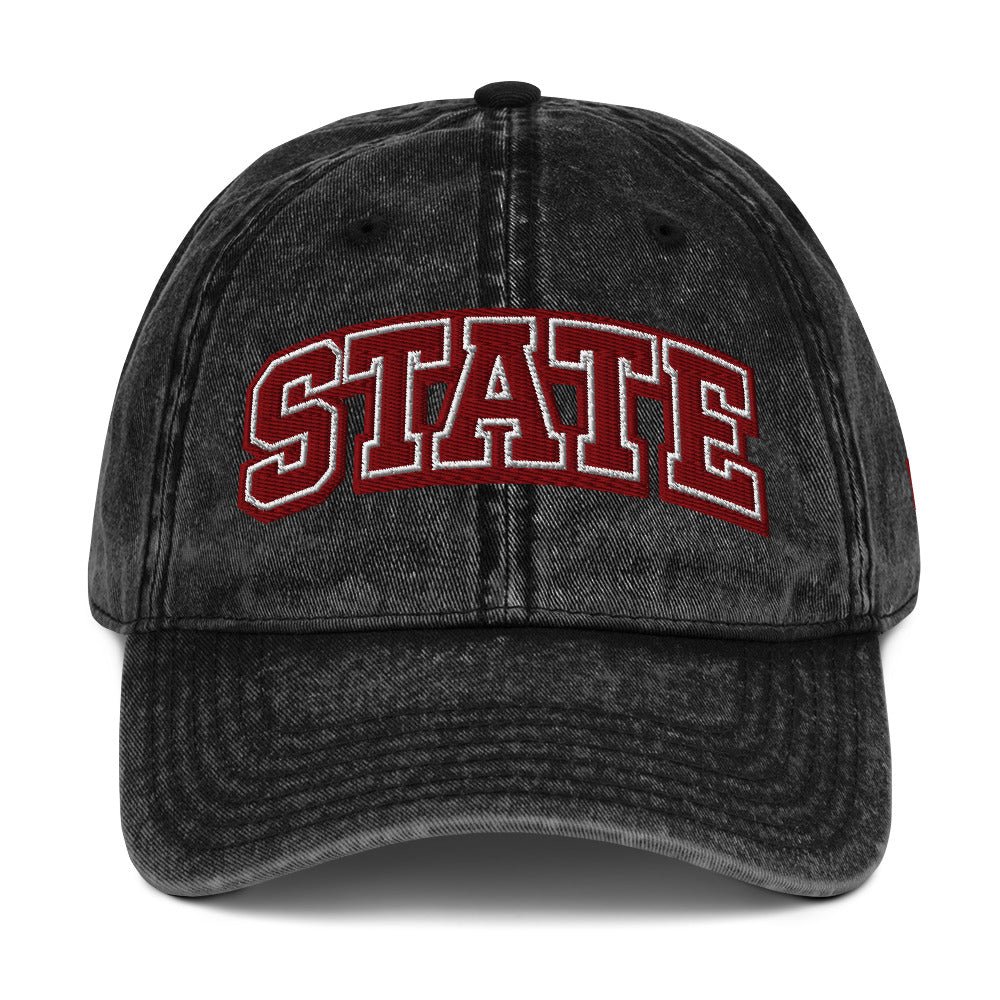 Front view of washed black HAGS State washed dad hat, showing maroon and white STATE embroidery.