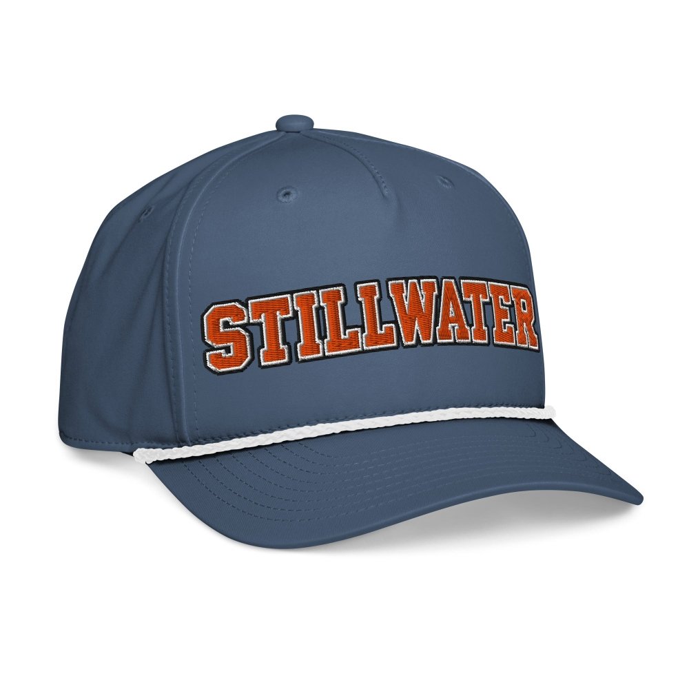 Opposite angled front view of navy HAGS Stillwater Oklahoma rope hat, showing orange STILLWATER lettering and contrasting rope.