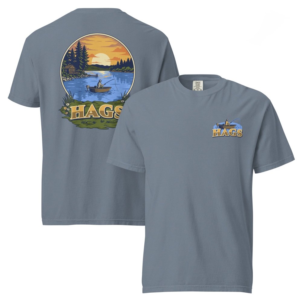 Front and back views of blue gray HAGS sunset fishing T-shirt, showing small HAGS fishing chest graphic and a sunset lake fishing illustration.