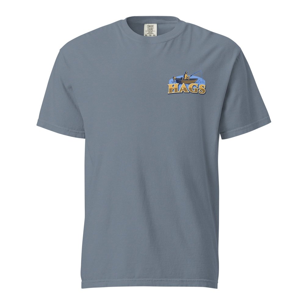 Front view of blue gray HAGS sunset fishing T-shirt, showing small HAGS fishing chest graphic.