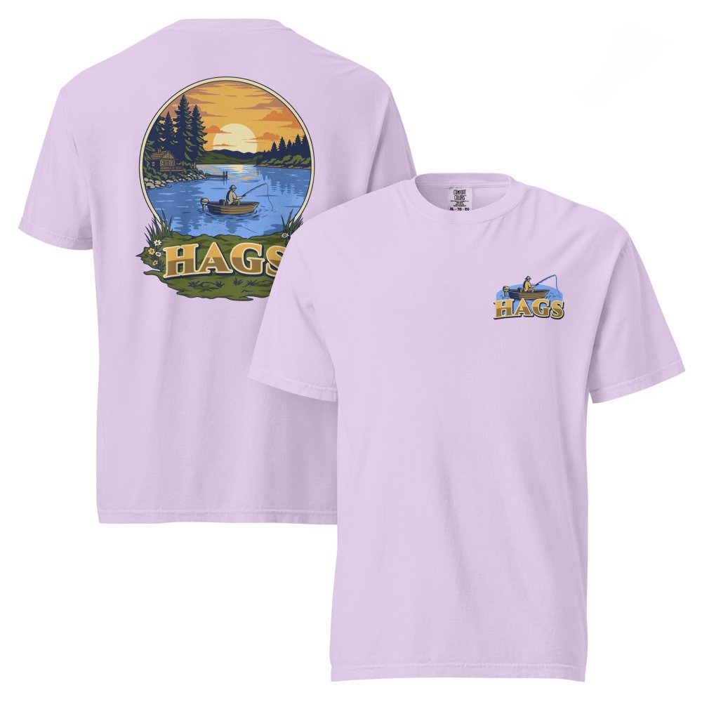 Front and back views of lavender HAGS sunset fishing T-shirt, showing small HAGS fishing chest graphic and a sunset lake fishing illustration.