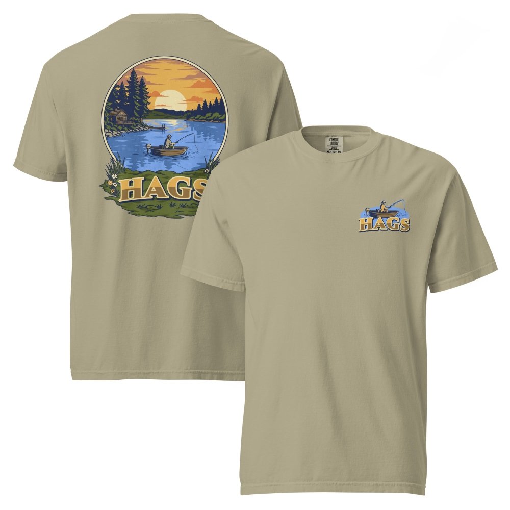 Front and back views of olive HAGS sunset fishing T-shirt, showing small HAGS fishing chest graphic and a sunset lake fishing illustration.