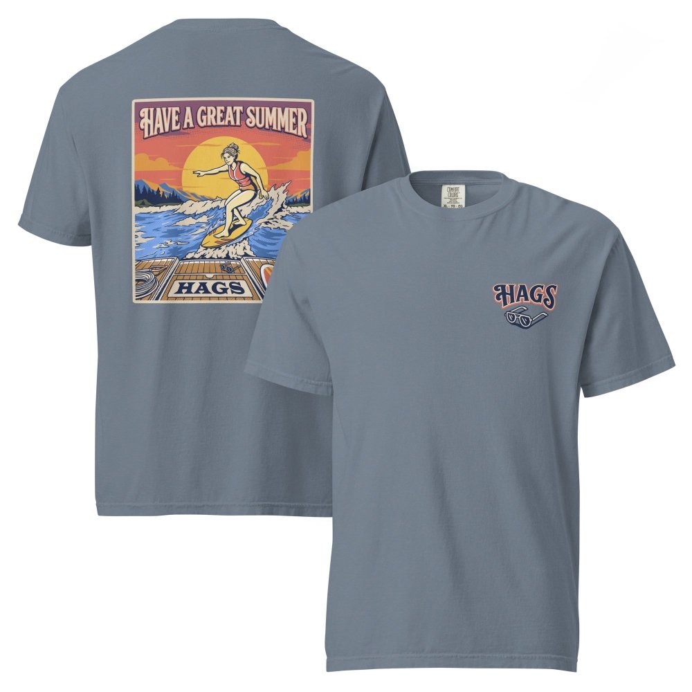 Front and back views of blue gray HAGS womens wakesurf T-shirt, showing small HAGS chest logo and a wakesurfer riding in front of a sunset.