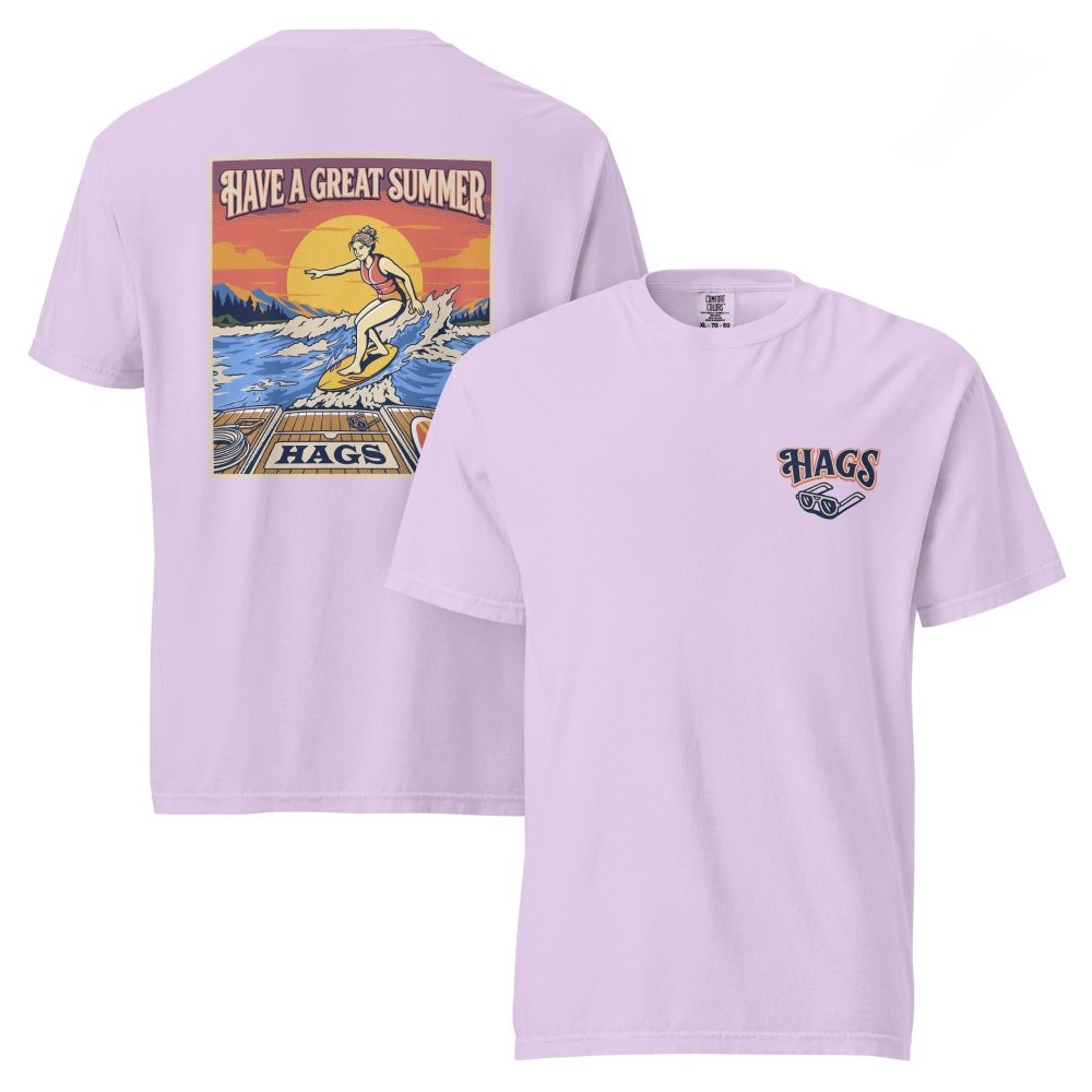 Front and back views of lavender HAGS womens wakesurf T-shirt, showing small HAGS chest logo and a wakesurfer riding in front of a sunset.