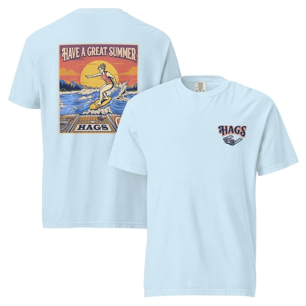 Front and back views of light blue HAGS womens wakesurf T-shirt, showing small HAGS chest logo and a wakesurfer riding in front of a sunset.