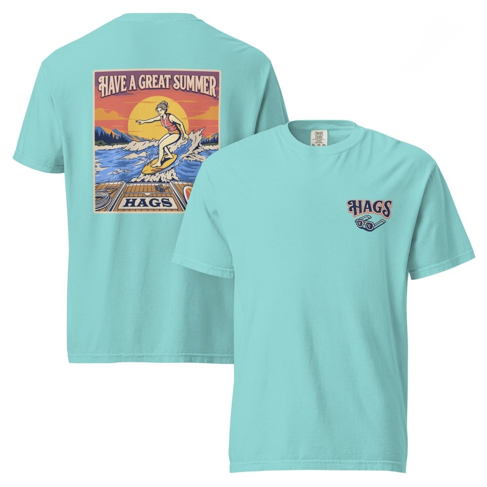 Front and back views of turquoise HAGS womens wakesurf T-shirt, showing small HAGS chest logo and a wakesurfer riding in front of a sunset.